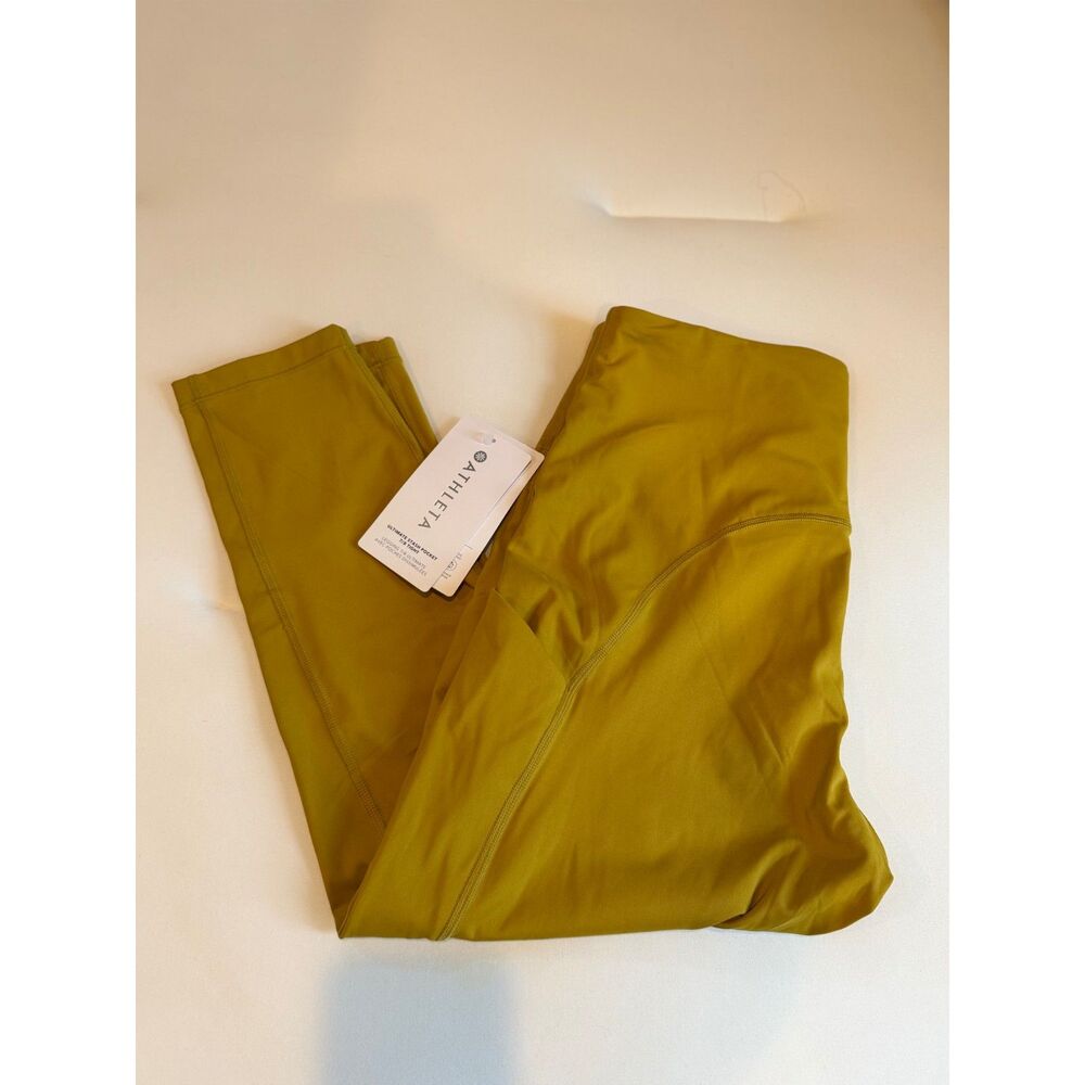 NWT Athleta Ultimate Stash Pocket 7/8 Tight Mustard Olive 1X
